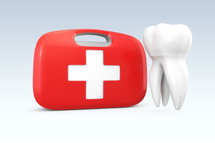 dental emergency kit next to a tooth